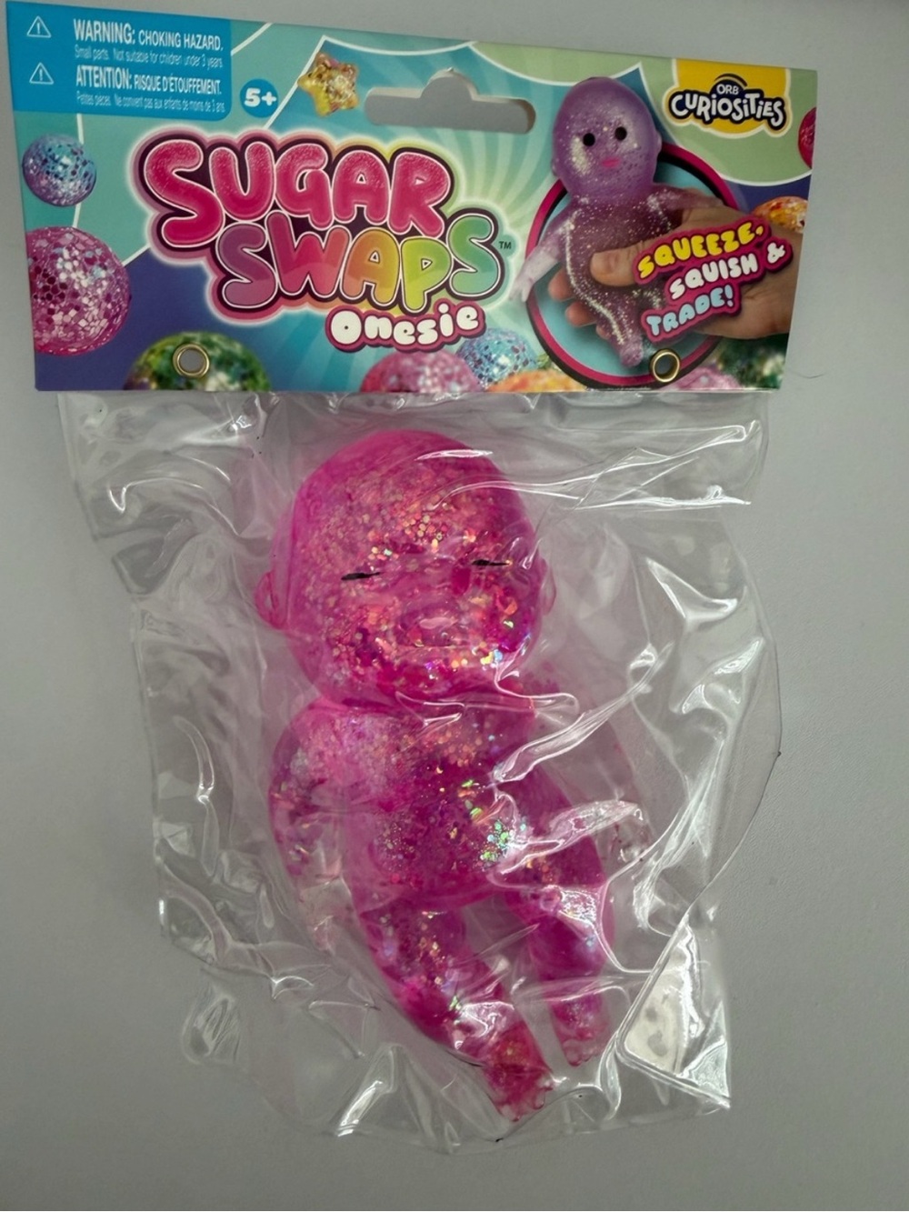 Sugar Swaps Onesie Squishy Sensory Toy - Pink Glitter